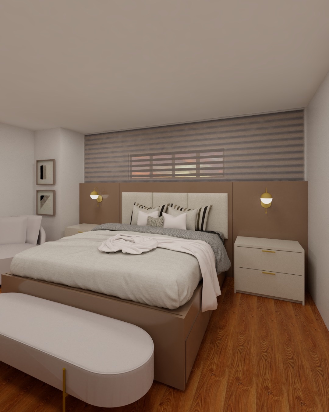 Bedroom with built-in tan upholstered headboard and integrated side tables, wood flooring, and gold sconces.